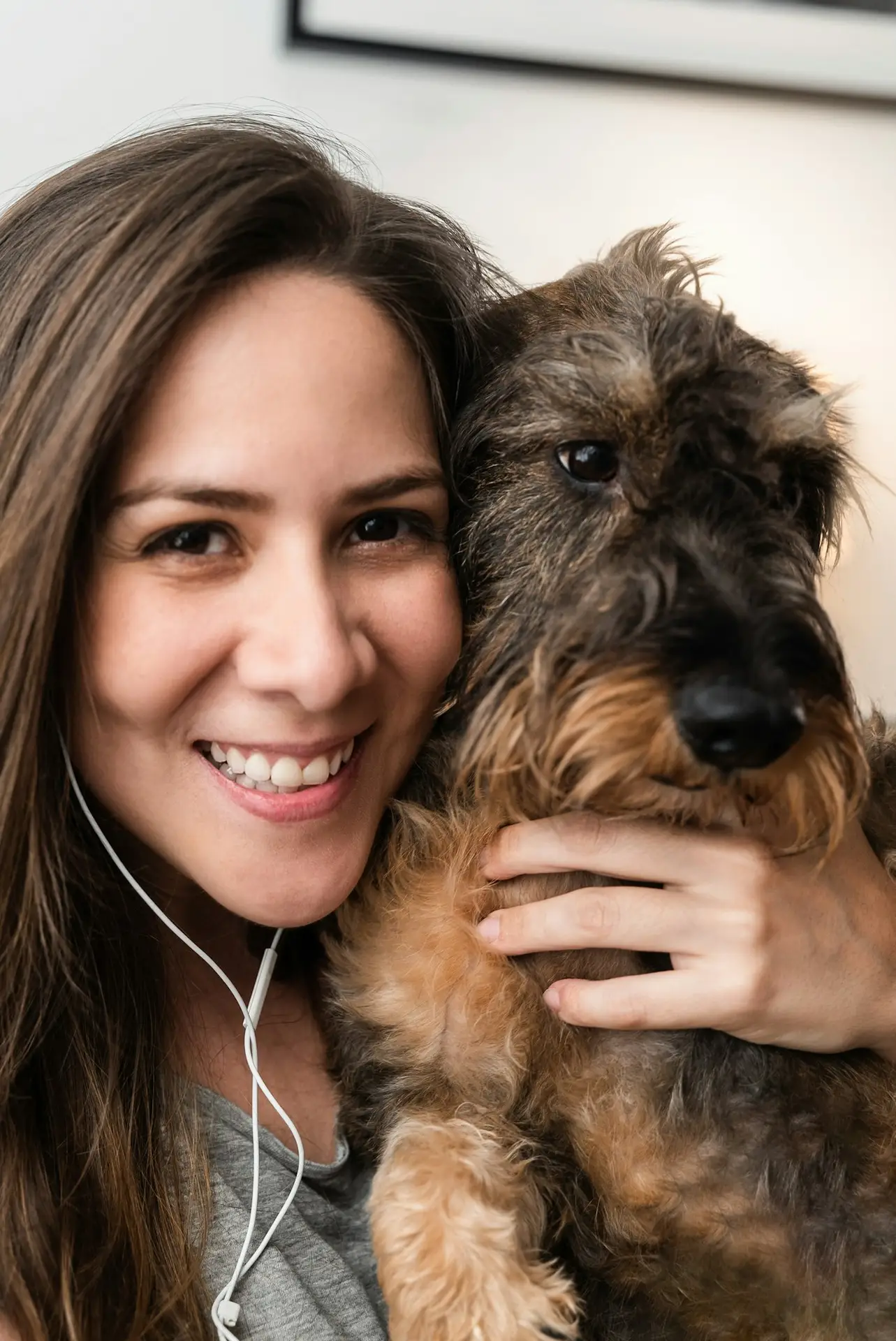 Portrait of happy woman and dog doing video call with mobile phone app - Online conference meeting